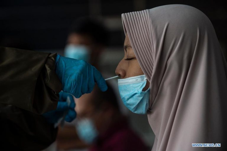 Indonesia reports 5,403 new COVID cases, 392 more deaths