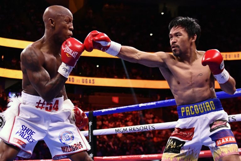 Cuban frustrates Pacquiao, retains welterweight title