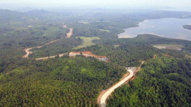 DPWH constructs access road on tourist haven Polillo Island