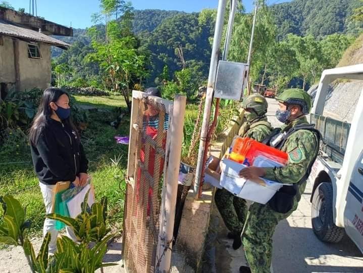 Benguet cops deliver modules to students
