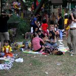 As Metro Manila shifted to the more relaxed Alert Level 2, families gather to have picnics at the Quezon Memorial Circle grounds in Quezon City on Friday (Nov. 5, 2021). The city government is allowing minors to enter the park as long as they are accompanied by parents or guardians. (PNA photo by Rico H.Borja)