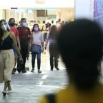 Some mall-goers no longer wear face shields as they stroll inside a mall at the Araneta City in Cubao, Quezon City on Tuesday (Nov. 16, 2021). The wearing of face shields is no longer a requirement in areas placed under Alert Levels 1 to 3. (PNA photo by Robert Oswald P. Alfiler)