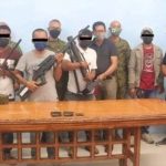 Three BIFF fighters turn themselves in with their high-powered firearms to military authorities in Midsayap, North Cotabato on Wednesday (Nov. 10). The surrenderers, joined in this photo by their relatives, said they grew tired of fighting for a lost cause and just wanted to be with their families again. (Photo courtesy of 602Bde via PNA)