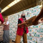 The Department of Social Welfare and Development (DSWD) preparing food packs to be given to people affected by Typhoon Odette. (Photo from DSWD Facebook page)