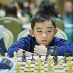 National Master Ivan Travis Cu added another trophy to his collection after winning the Chess Palace Philippines Age-Group Chess Championships Under-12 division on Tuesday, Nov. 30. [photo  credit: Mr. Teddy Cu]