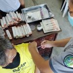 A person deprived of liberty (PDL) getting his COVID-19 vaccine shot. (Photo courtesy of BJMP Nasugbu Facebook via PNA)