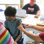 A teenage boy receives a Covid-19 vaccine dose at the newly-renovated Manila Zoo on Wednesday (Jan. 19, 2022). The Manila Zoo will accommodate a maximum of 1,000 daily by schedule, including the companions, and they are also allowed to roam around free of charge from 8 a.m. to 8 p.m. (PNA photo by Avito Dalan)
