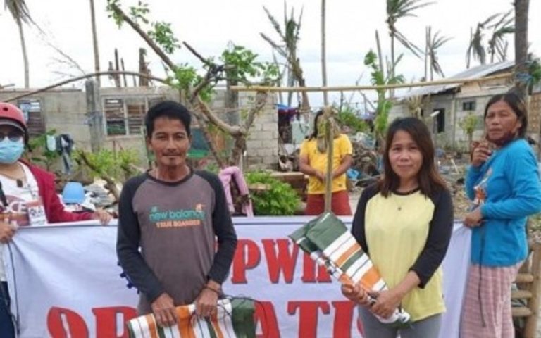 Typhoon-hit Limasawa residents get tarps for temporary roofing