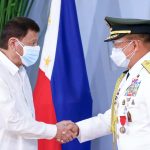 President Rodrigo Roa Duterte congratulates newly-promoted Brigadier General, Presidential Security Group Commander Randolph Gonzalez Cabangbang during the donning of rank at the Malacañang Golf (Malago) Clubhouse in Malacañang Park, Manila on February 11, 2022. RICHARD MADELO/ PRESIDENTIAL PHOTO