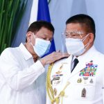 President Rodrigo Roa Duterte pins the rank insignia on newly-promoted Brigadier General, Presidential Security Group Commander Randolph Gonzalez Cabangbang during the donning of rank at the Malacañang Golf (Malago) Clubhouse in Malacañang Park, Manila on February 11, 2022. RICHARD MADELO/ PRESIDENTIAL PHOTO