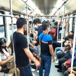Passengers of the Light Rail Transit 1 (LRT-1) follow basic safety protocols against Covid-19, like wearing masks, on Friday (Jan. 28, 2022). (PNA photo by Jess M. Escaros Jr.)