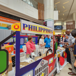 Ambassador Marie Charlotte G. Tang (rightmost) accompanies Guest of Honor Mr. Stanley Mwangi of the Kenyan Ministry of Foreign and Diaspora Affairs at the Philippine booth at the ASEAN Festival.