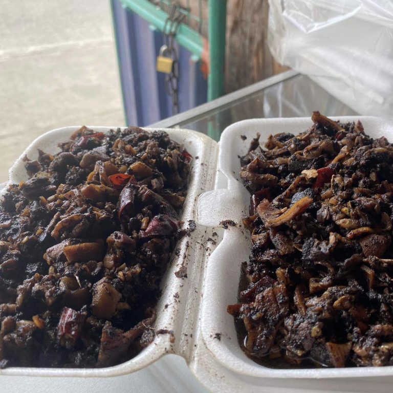 Senior citizen arrested for selling adobo, dinuguan made from dog meat