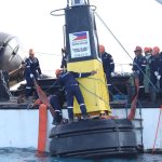The Philippine Coast Guard (PCG) installs additional buoys in the Kalayaan Island Group, May 2023. (Photo courtesy of PCG)