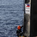 The Philippine Coast Guard (PCG) installs additional buoys in the Kalayaan Island Group, May 2023. (Photo courtesy of PCG)