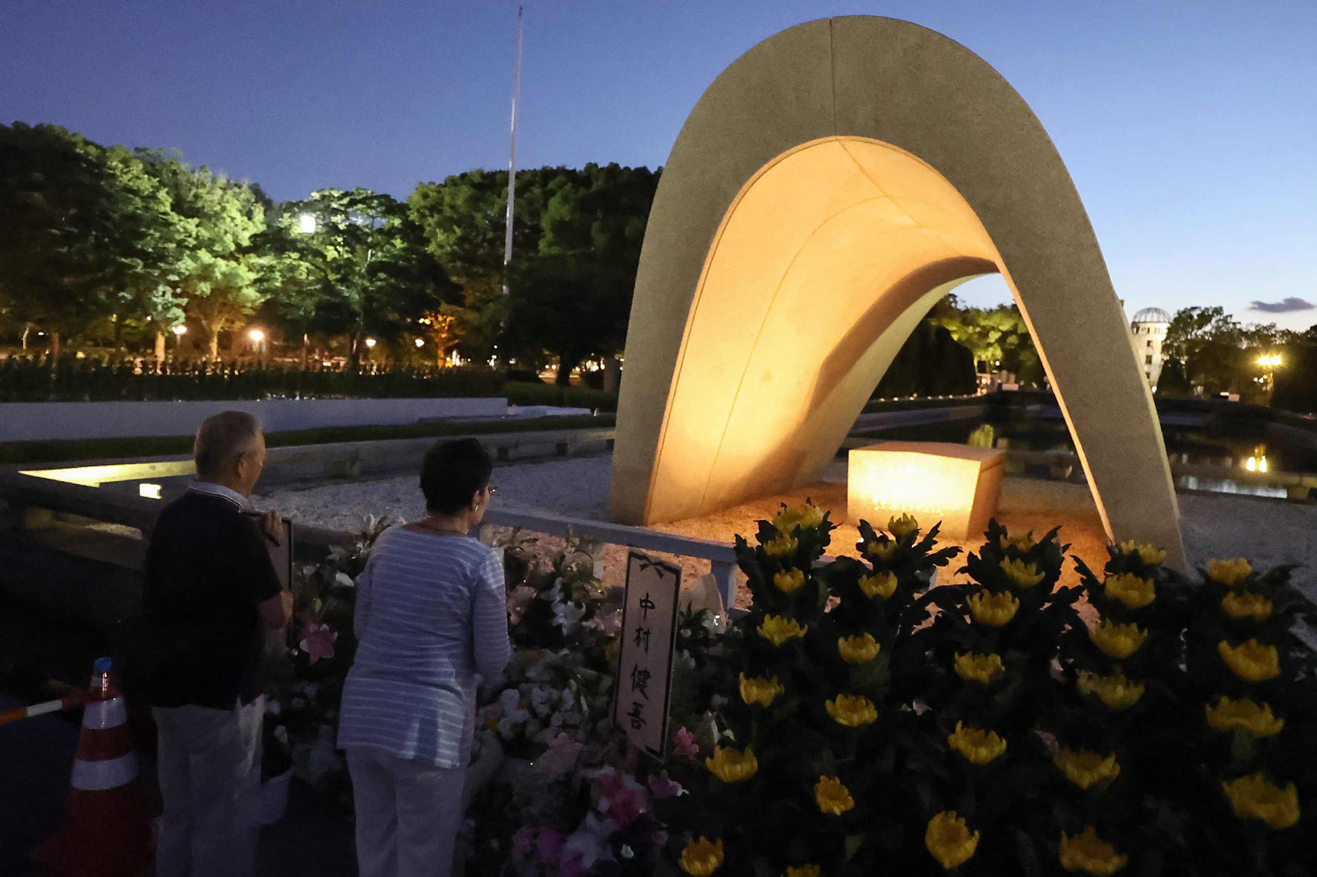 People Visit And Say Prayers At Sunrise At The Cenotaph For The Atomic ...