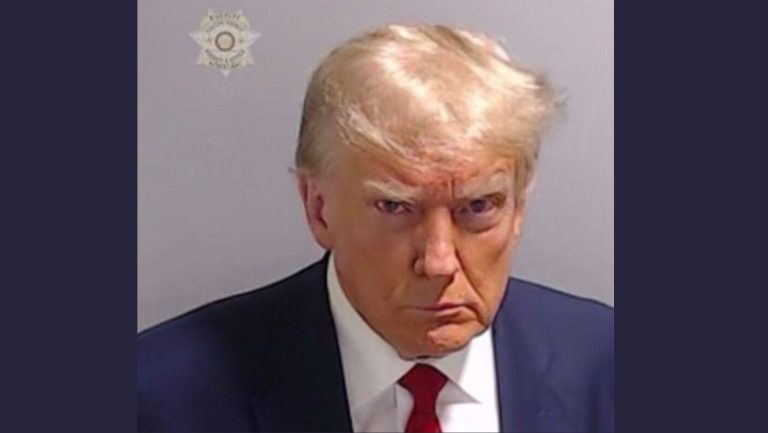 Trump arrested in election case, mug shot released