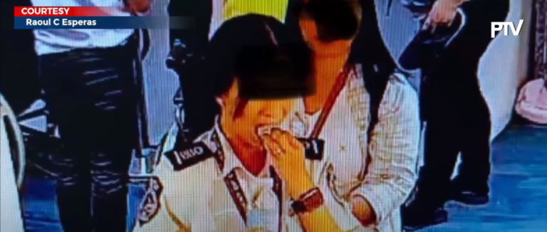 Screening officer at NAIA caught on CCTV trying to swallow $300