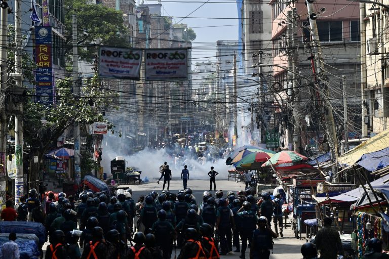 Bangladesh garment workers clash with police as factories reopen
