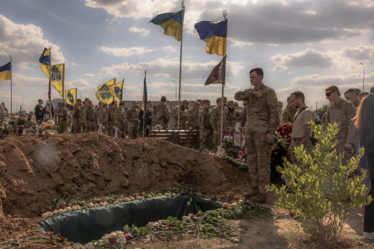 ‘Gave his youth for us’: Hundreds mourn iconic Ukrainian soldier