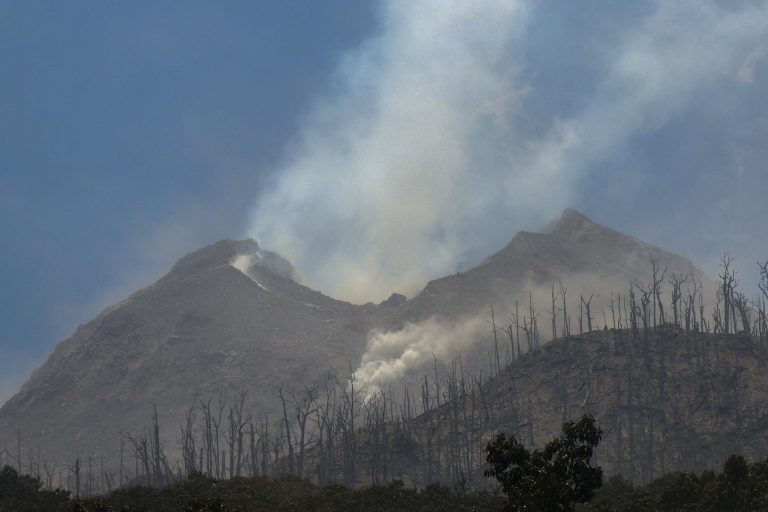 Indonesia volcano eruption kills 10, sets houses aflame