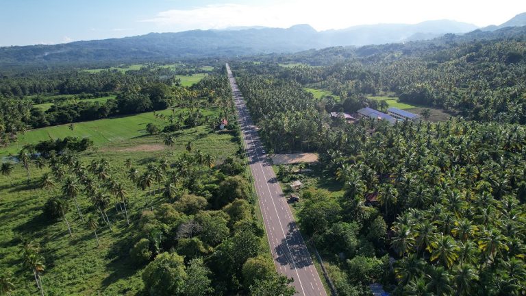 Davao Oriental Coastal Road made safer thru DPWH’s asphalt works